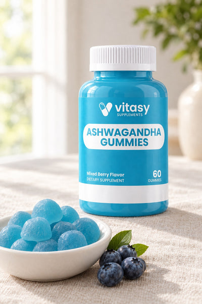 Blue gummies in a dish next to the bottle
