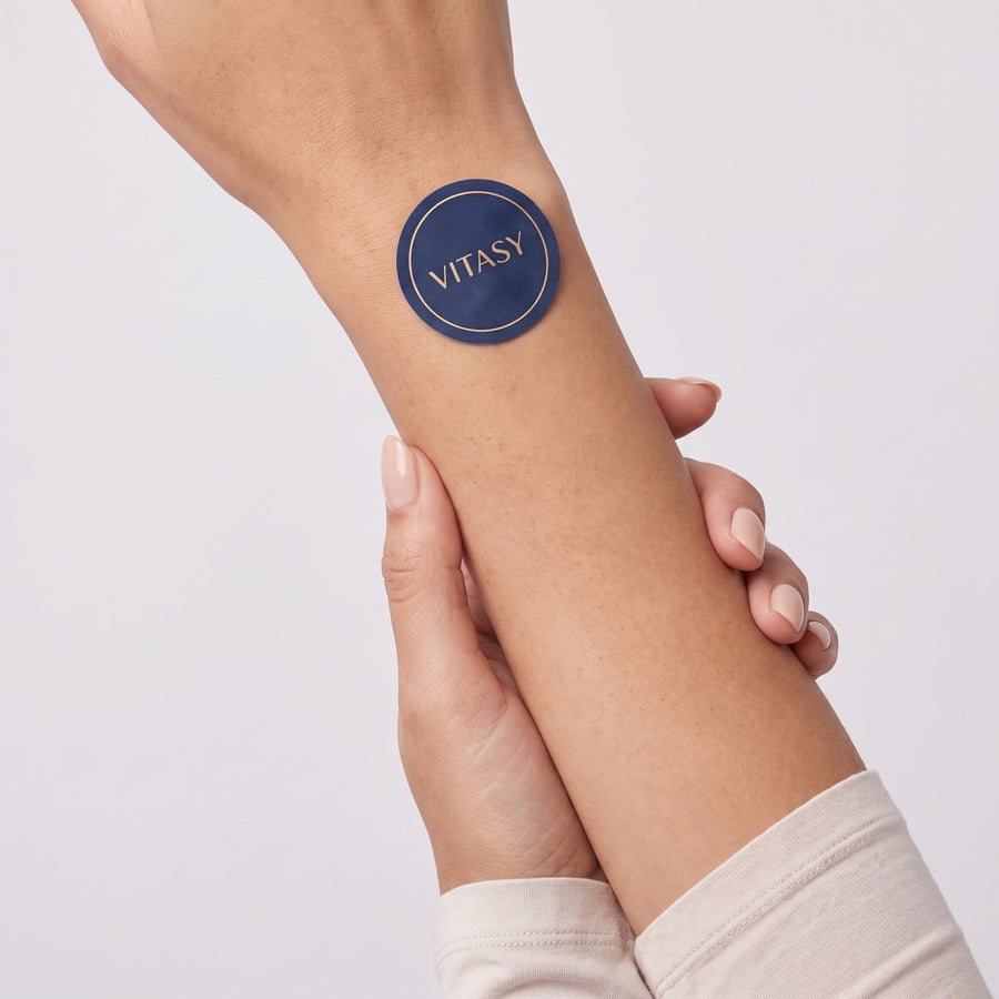 Vitasy patch worn on the forearm