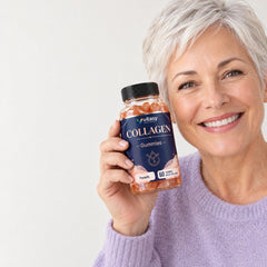 Woman holding a bottle of Vitasy Collagen Gummies