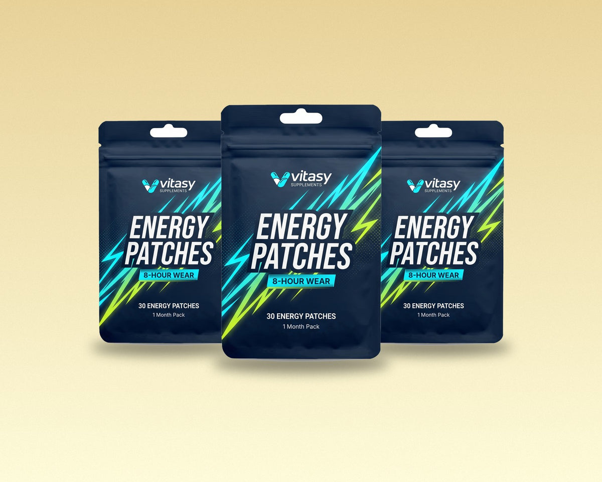 Three Vitasy Energy Patches pouches on a warm cream background