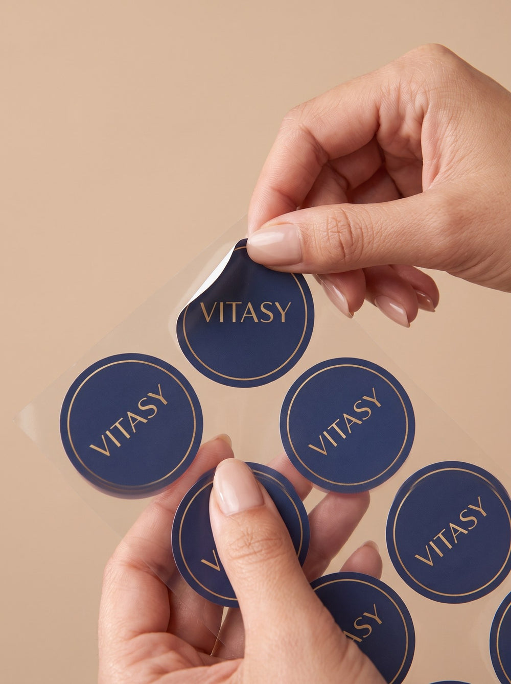 Applying a Vitasy Energy Patch to the upper arm