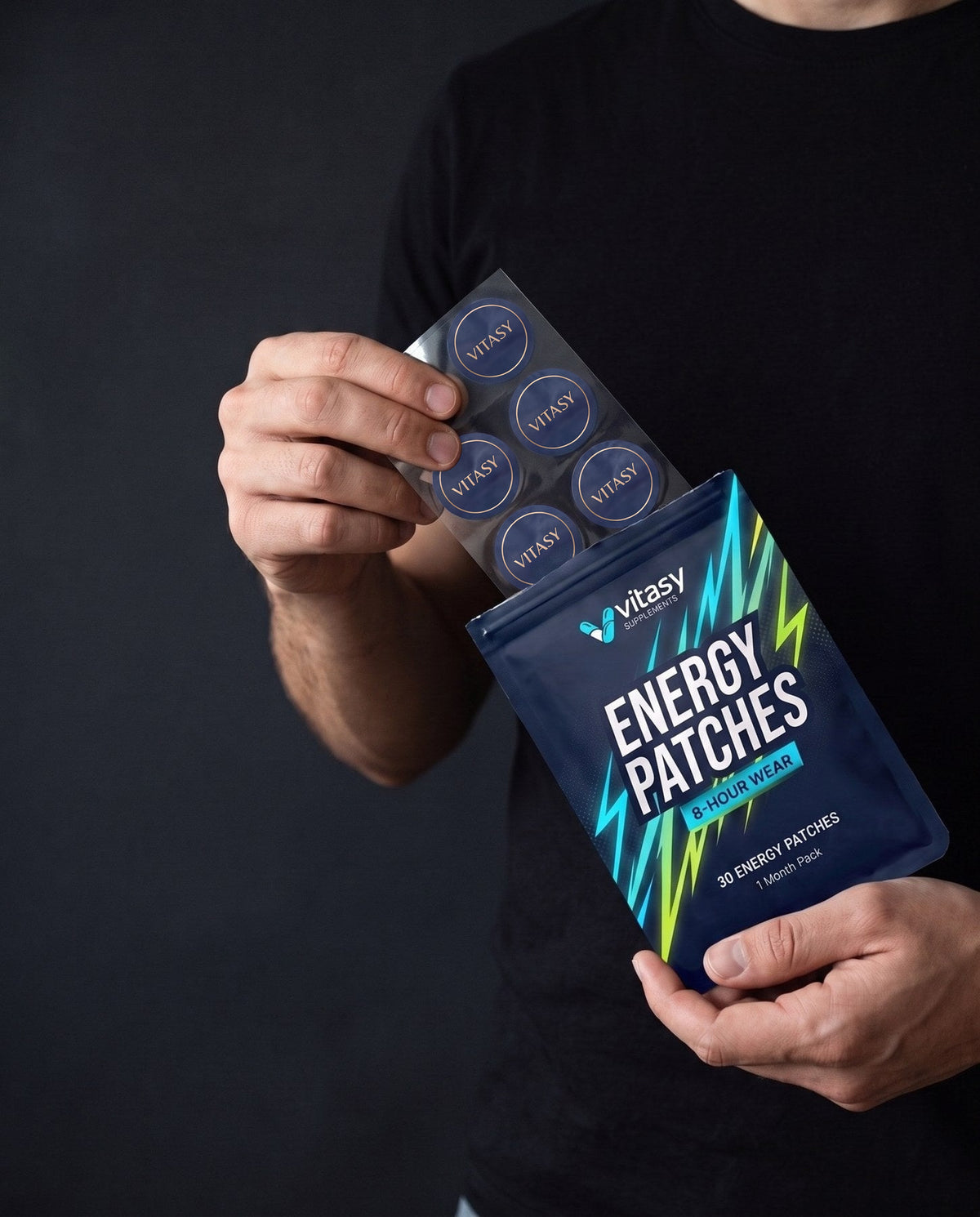 Hand holding a Vitasy Energy Patches pouch