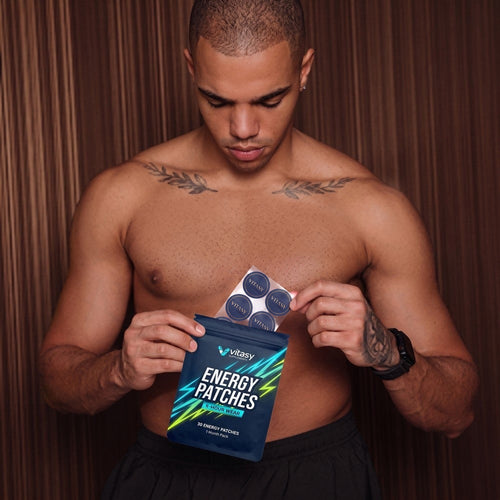 Man taking a patch from a Vitasy pouch