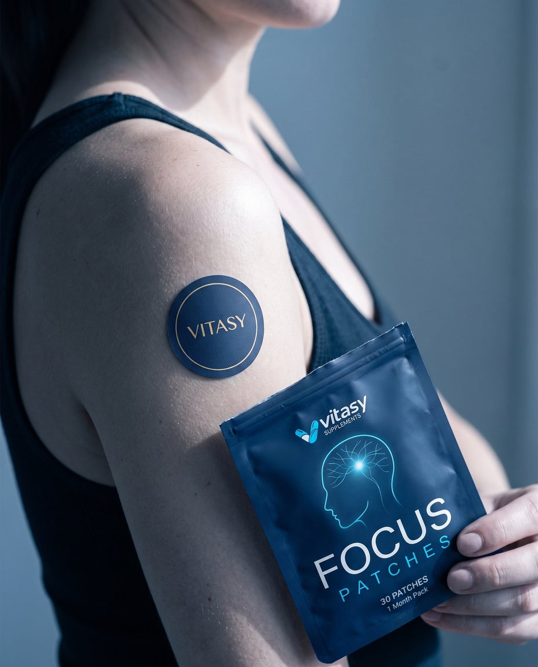 Vitasy patch on the shoulder with the Focus Patches pouch