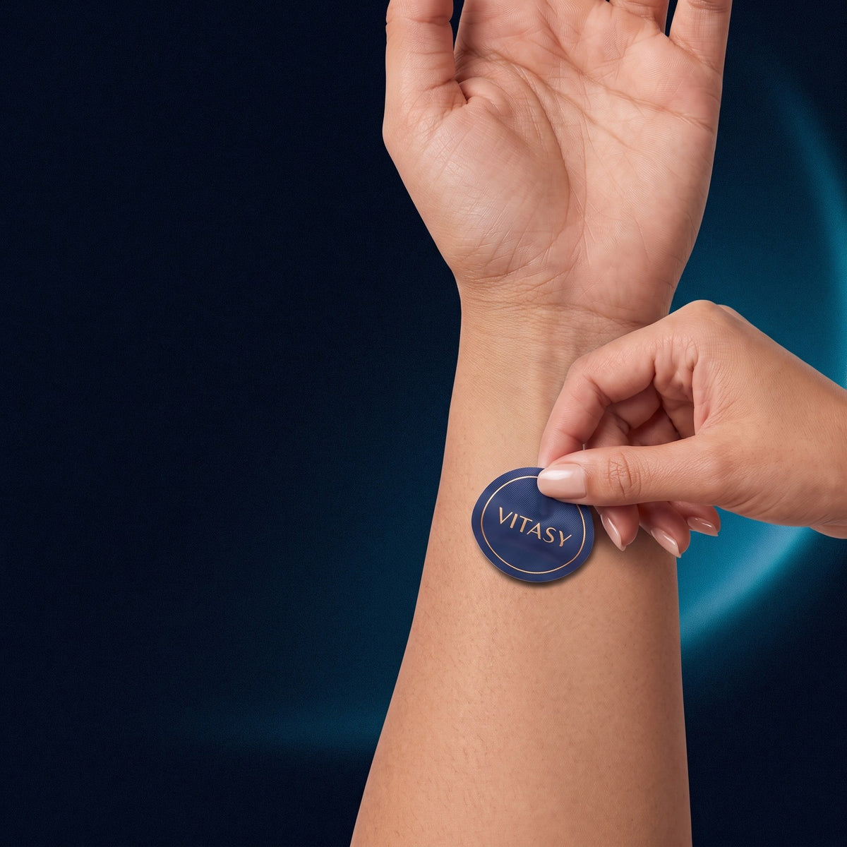 Applying a Vitasy Focus Patch to the wrist