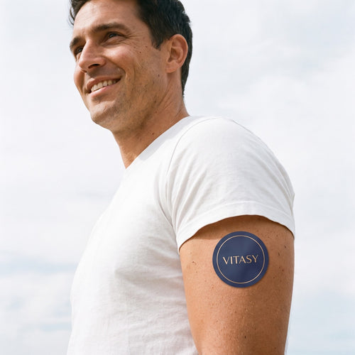Man outdoors with a Vitasy patch on his upper arm