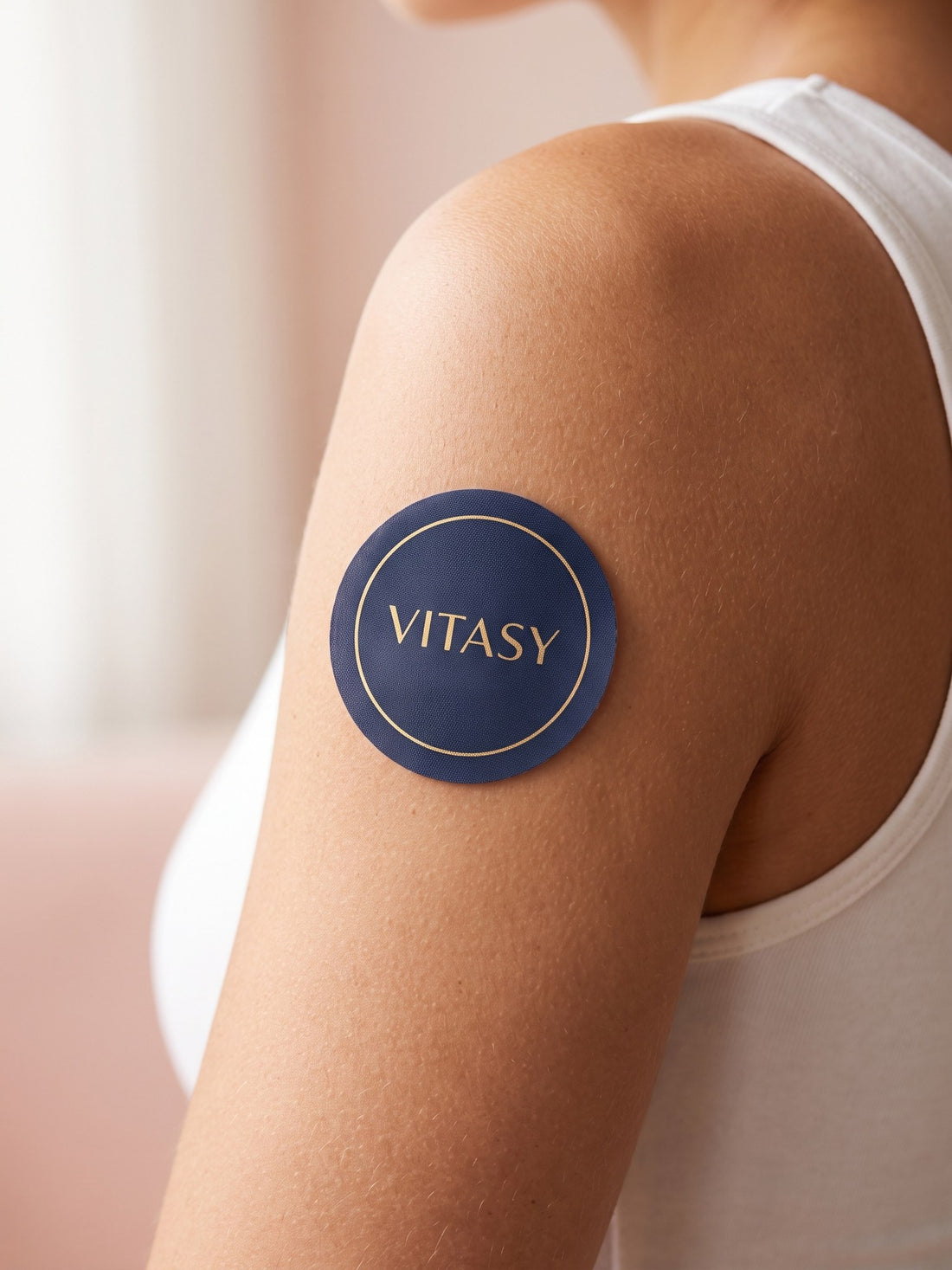 Vitasy patch on an upper arm