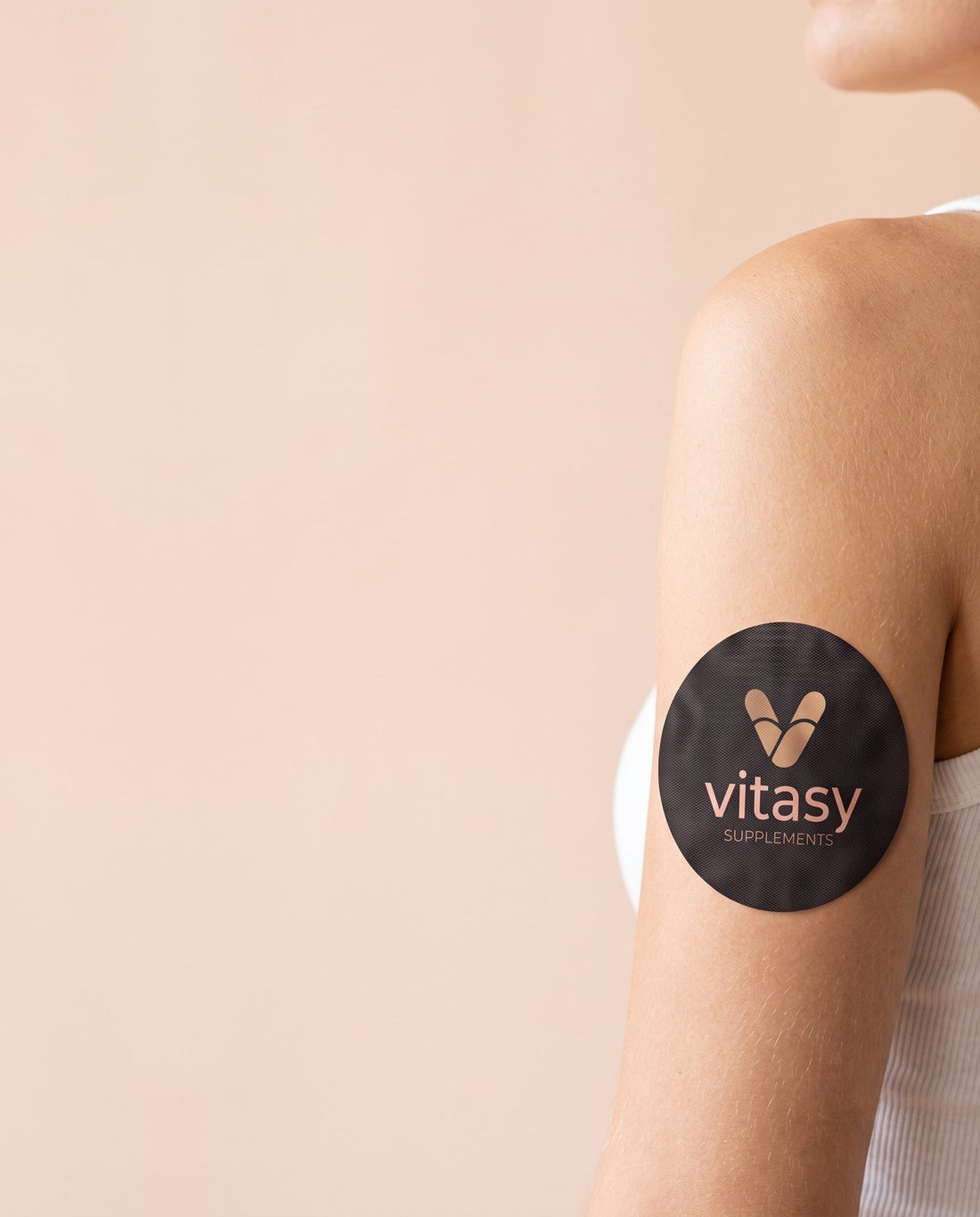 Vitasy patch worn on the upper arm