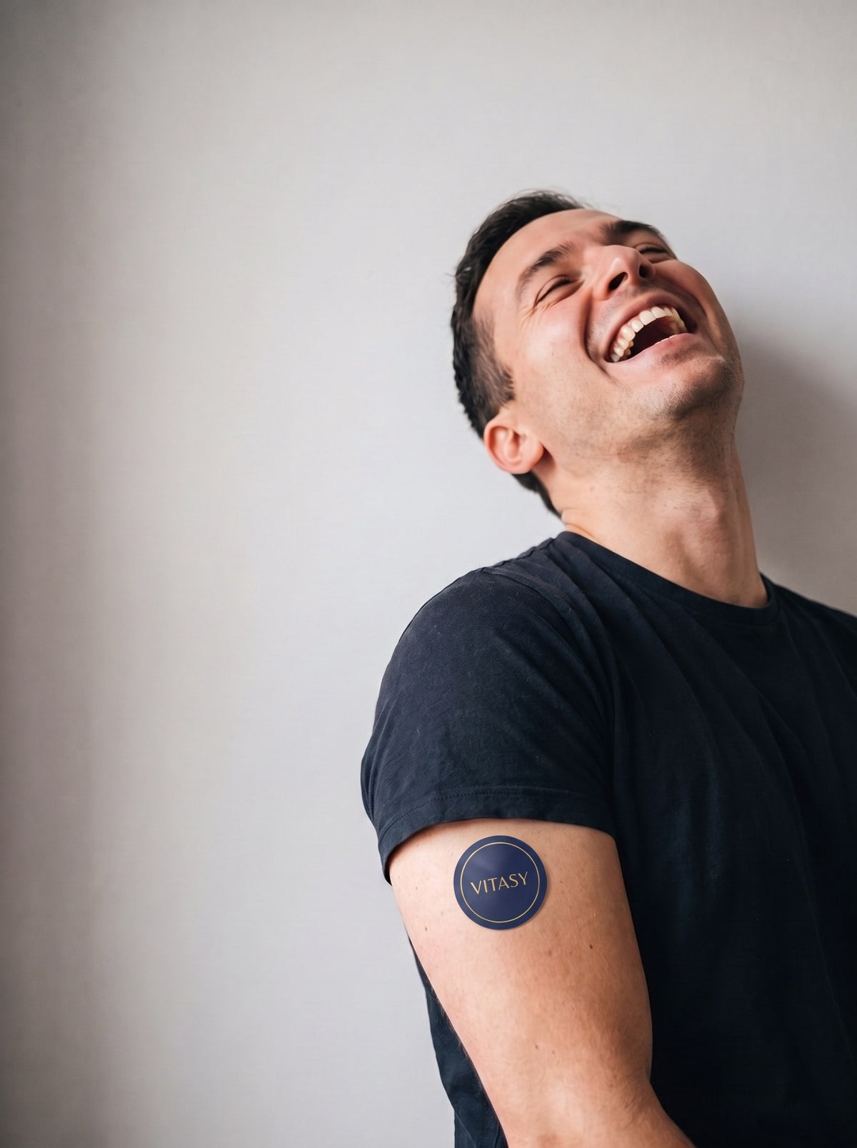 Man wearing a Vitasy patch