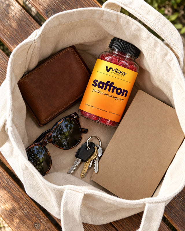 The Vitasy saffron bottle in an open tote bag