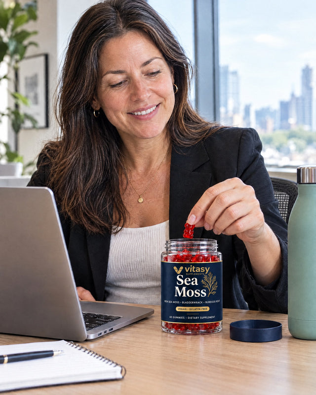 Woman at her office desk with the Vitasy jar