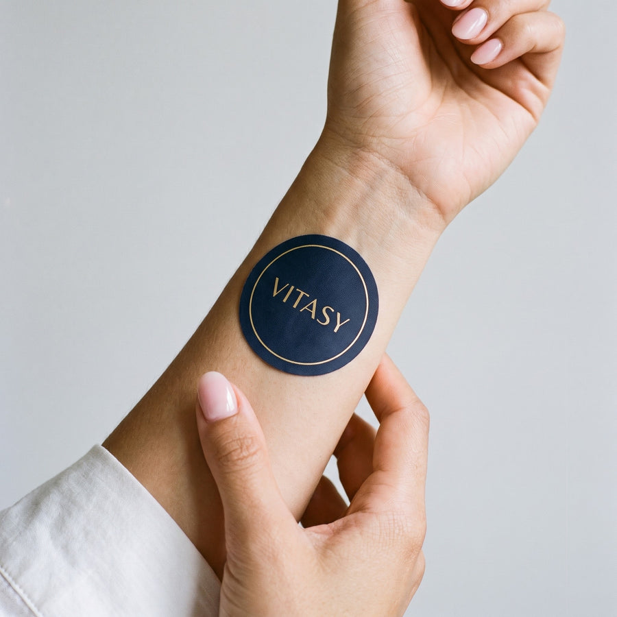 Vitasy patch worn on the forearm