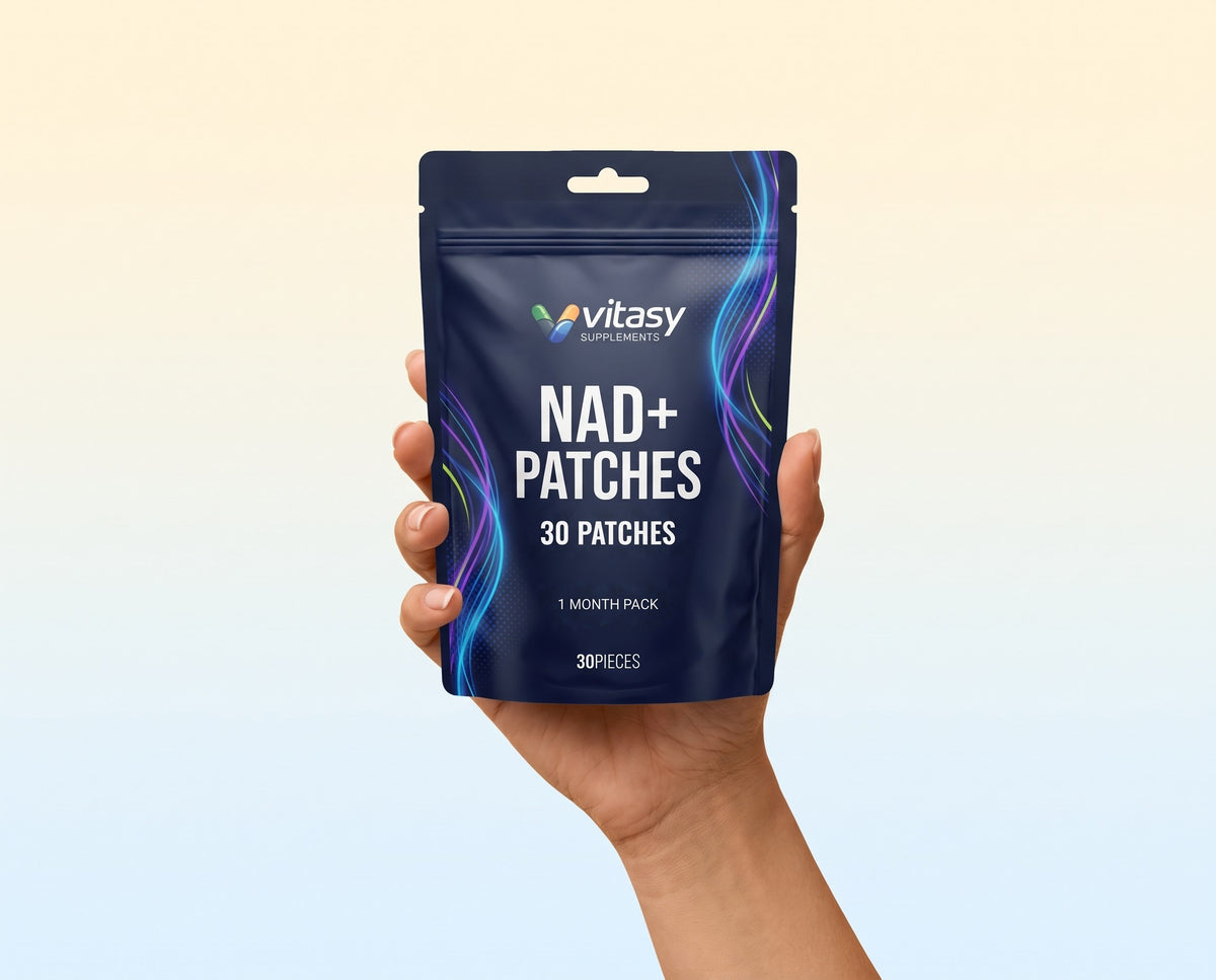 Hand holding a pouch of Vitasy NAD+ Patches