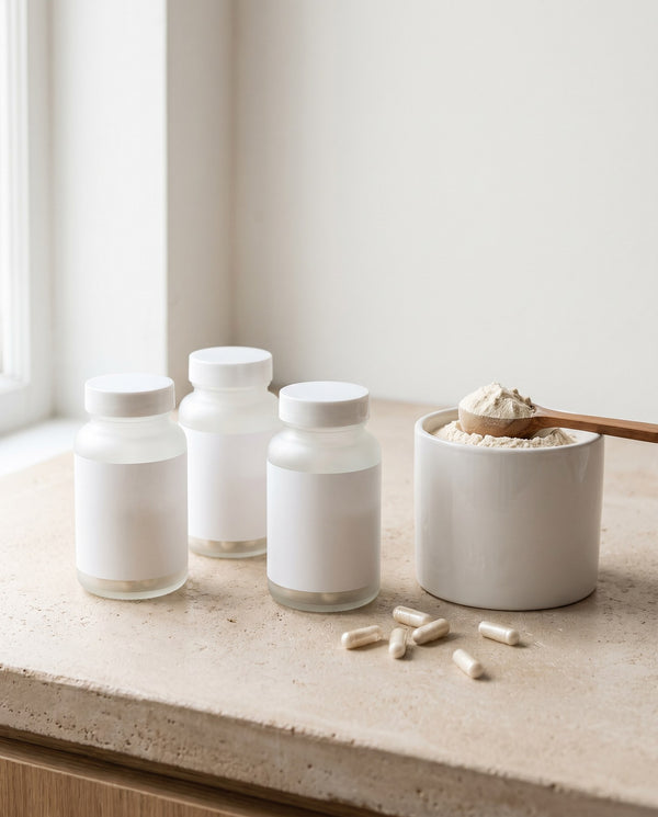 Capsules and a powder tub on a counter