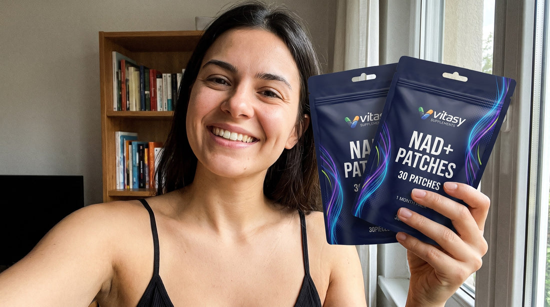Smiling woman holding two pouches of Vitasy NAD+ Patches