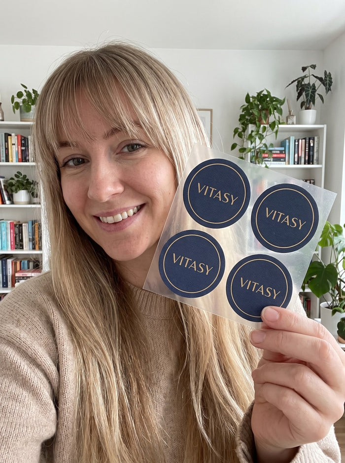 Women holding Vitasy NAD+ Patches pouches and patches