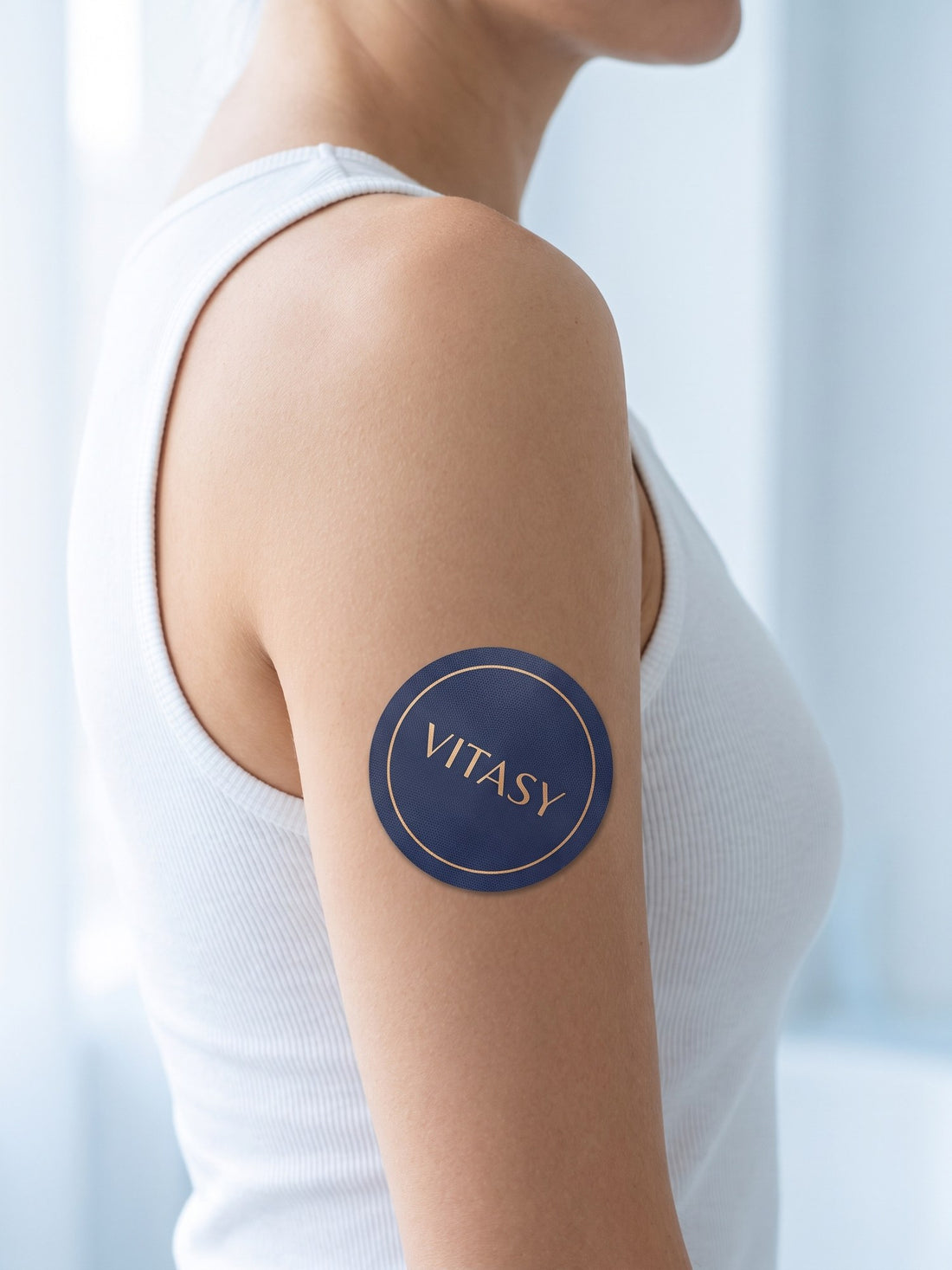 Vitasy patch on an upper arm