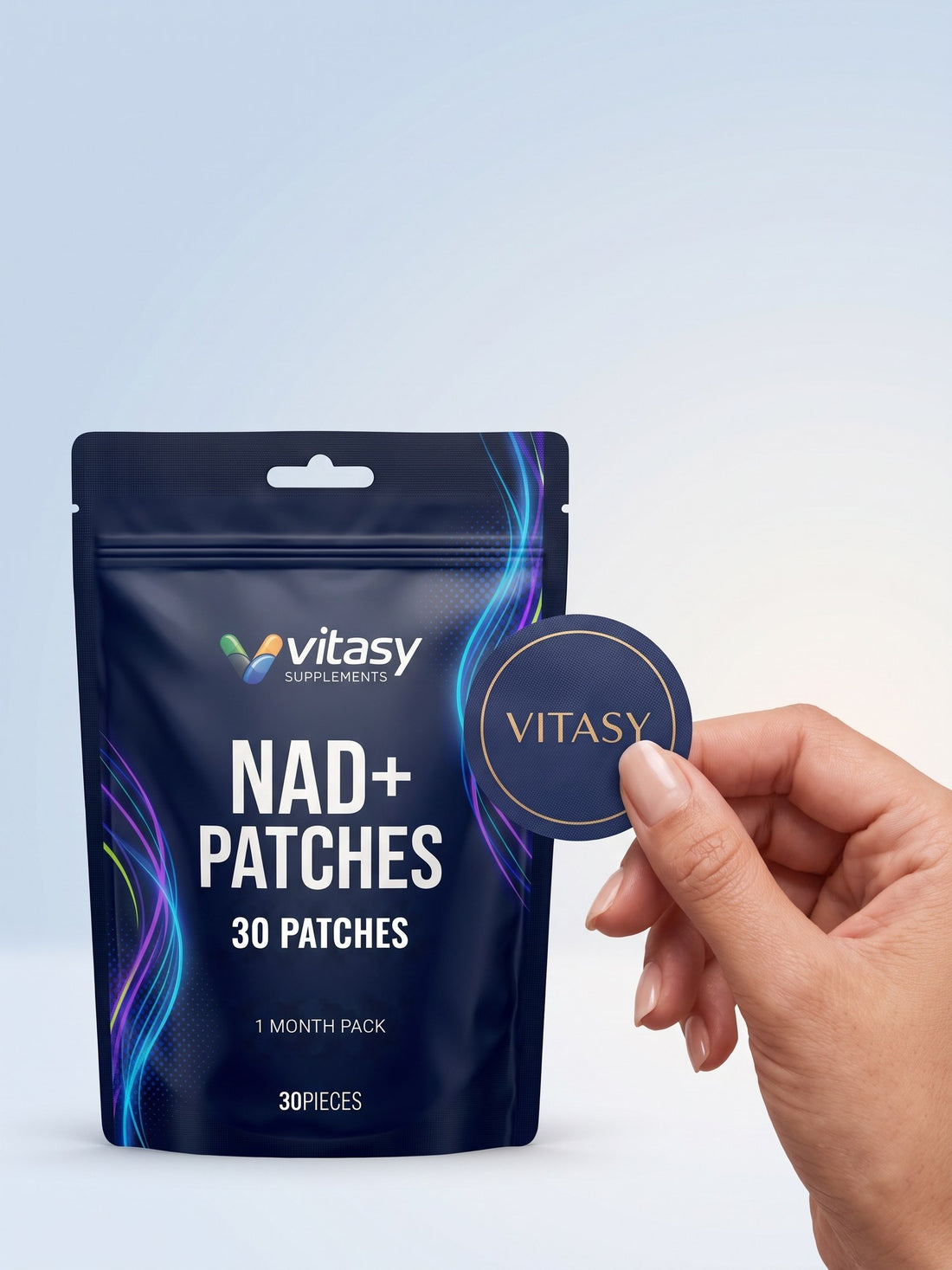 Vitasy NAD+ Patches pouch and fingers holding a Vitasy patch