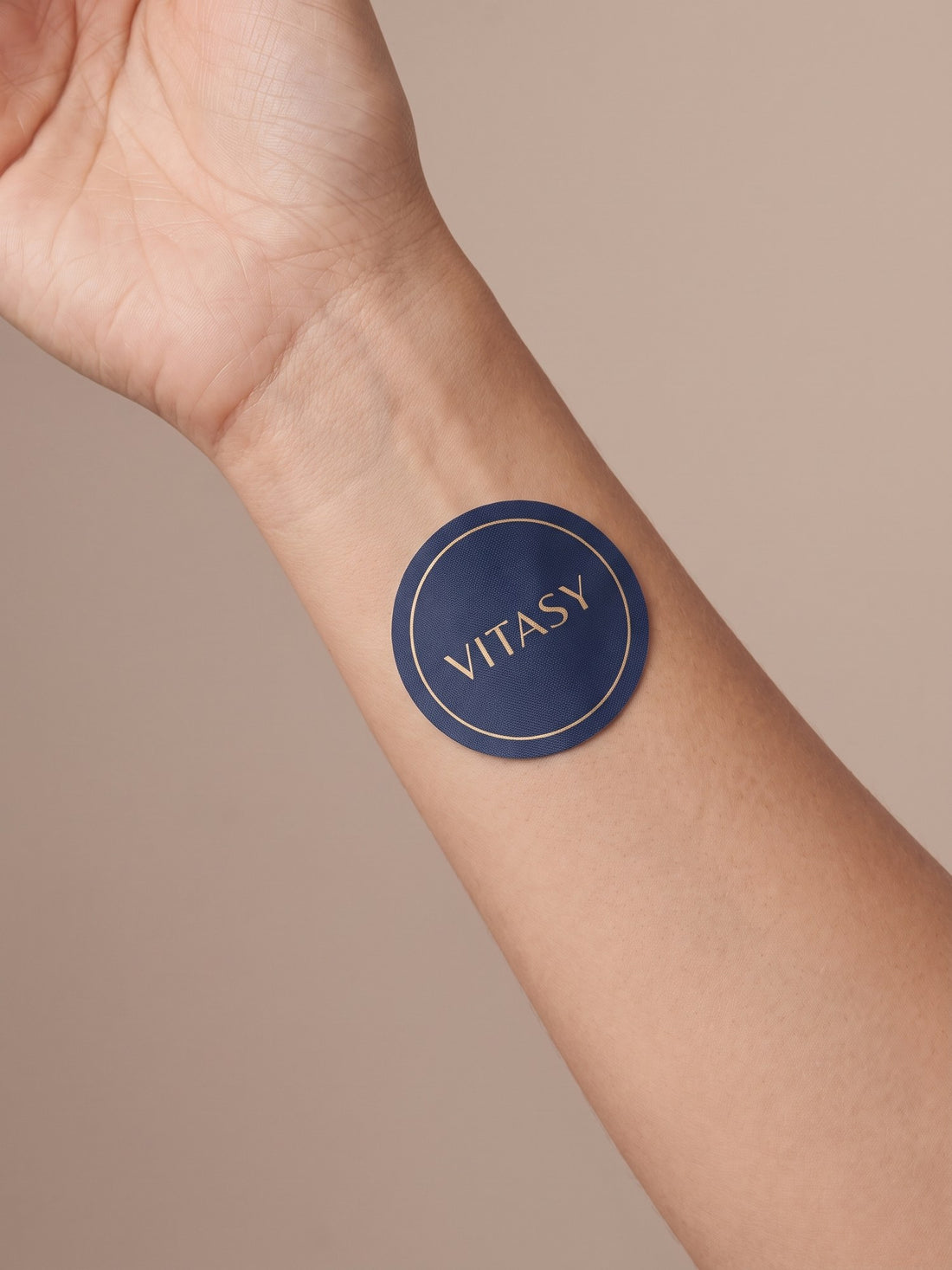 Vitasy patch on an inner wrist