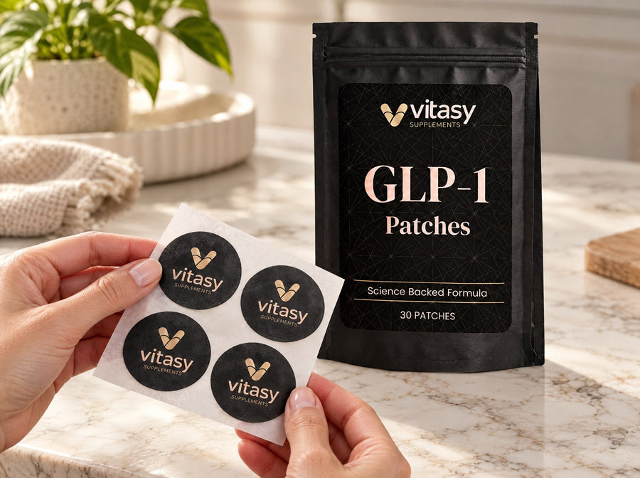 Fingers holding a sheet of GLP-1 Patches