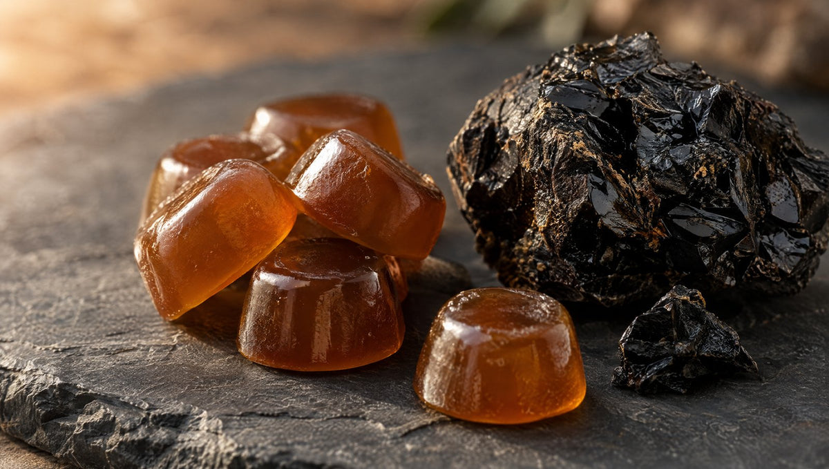 Close-up of shilajit gummies and raw resin