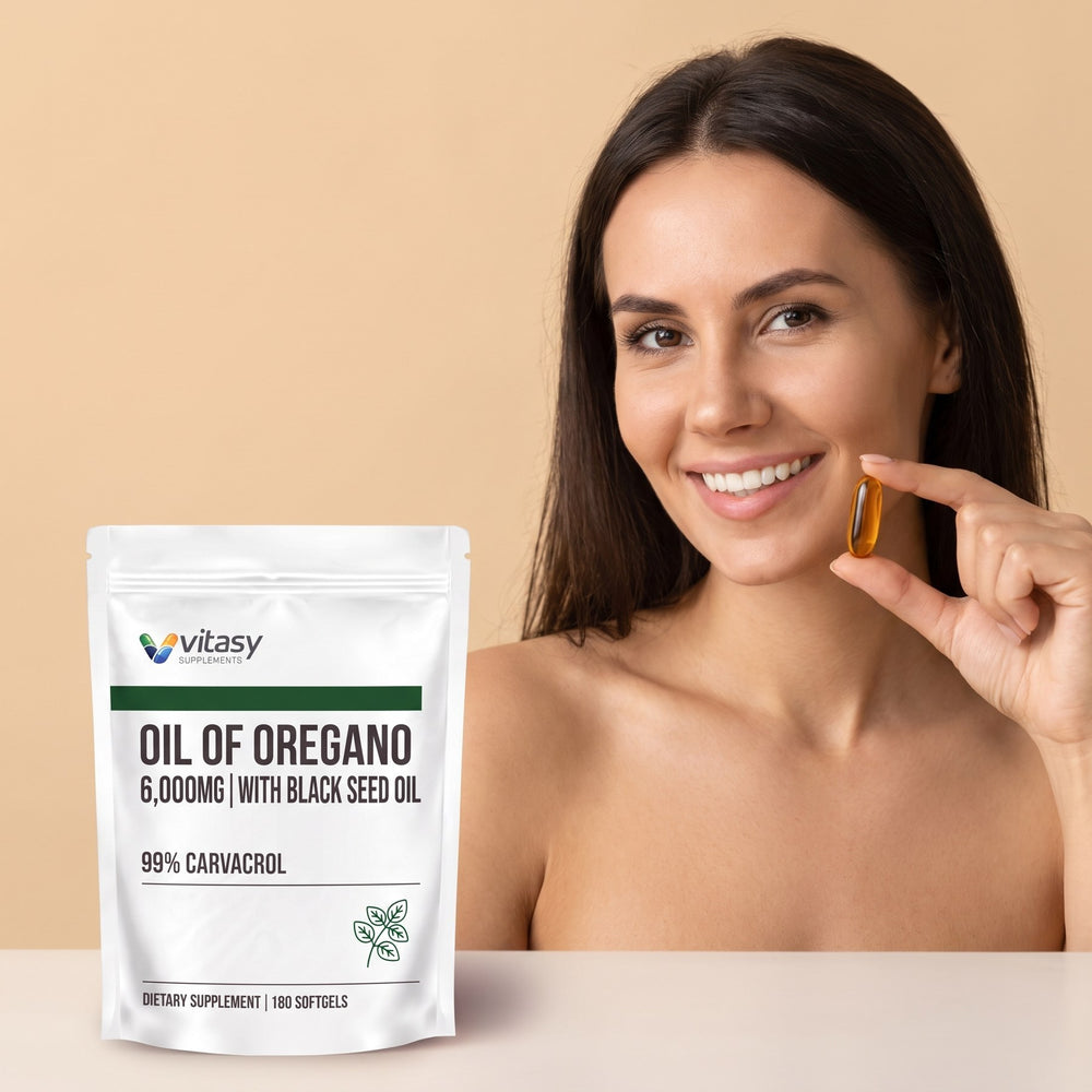 Woman holding a softgel next to the Vitasy Oil of Oregano pouch