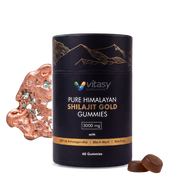 Shilajit Gummies v1 - 01 clean hero with bottle, mineral rock and two gummies