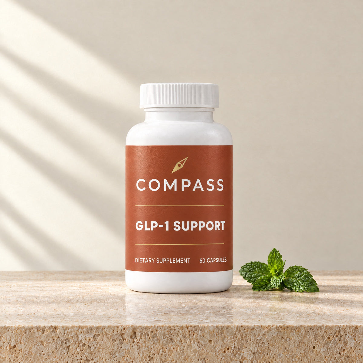 Compass GLP-1 Support terracotta, 60 capsules, bottle on travertine