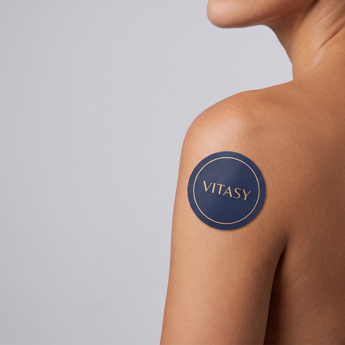 Close-up of a Vitasy patch on a shoulder