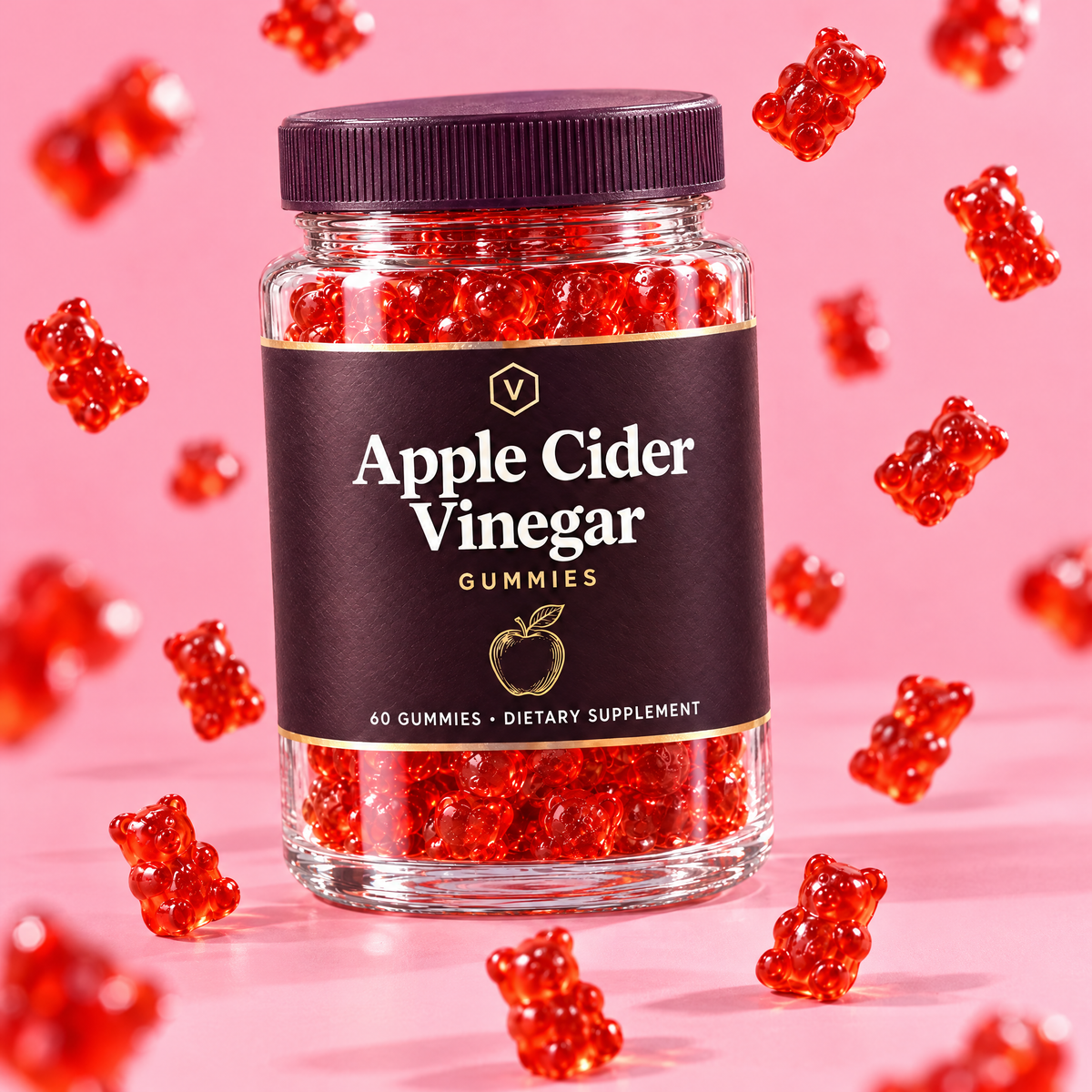 Vitasy Apple Cider Vinegar Gummies jar with red gummy bears on pink