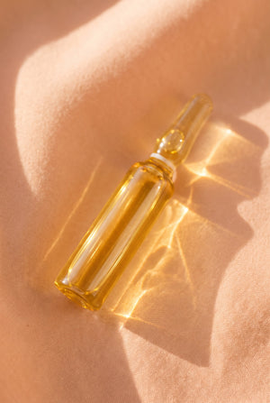 Golden vitamin ampoule