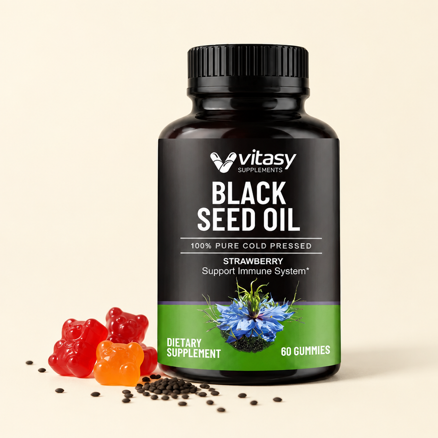 Black Seed Oil Gummies jar with loose gummies and black cumin seeds