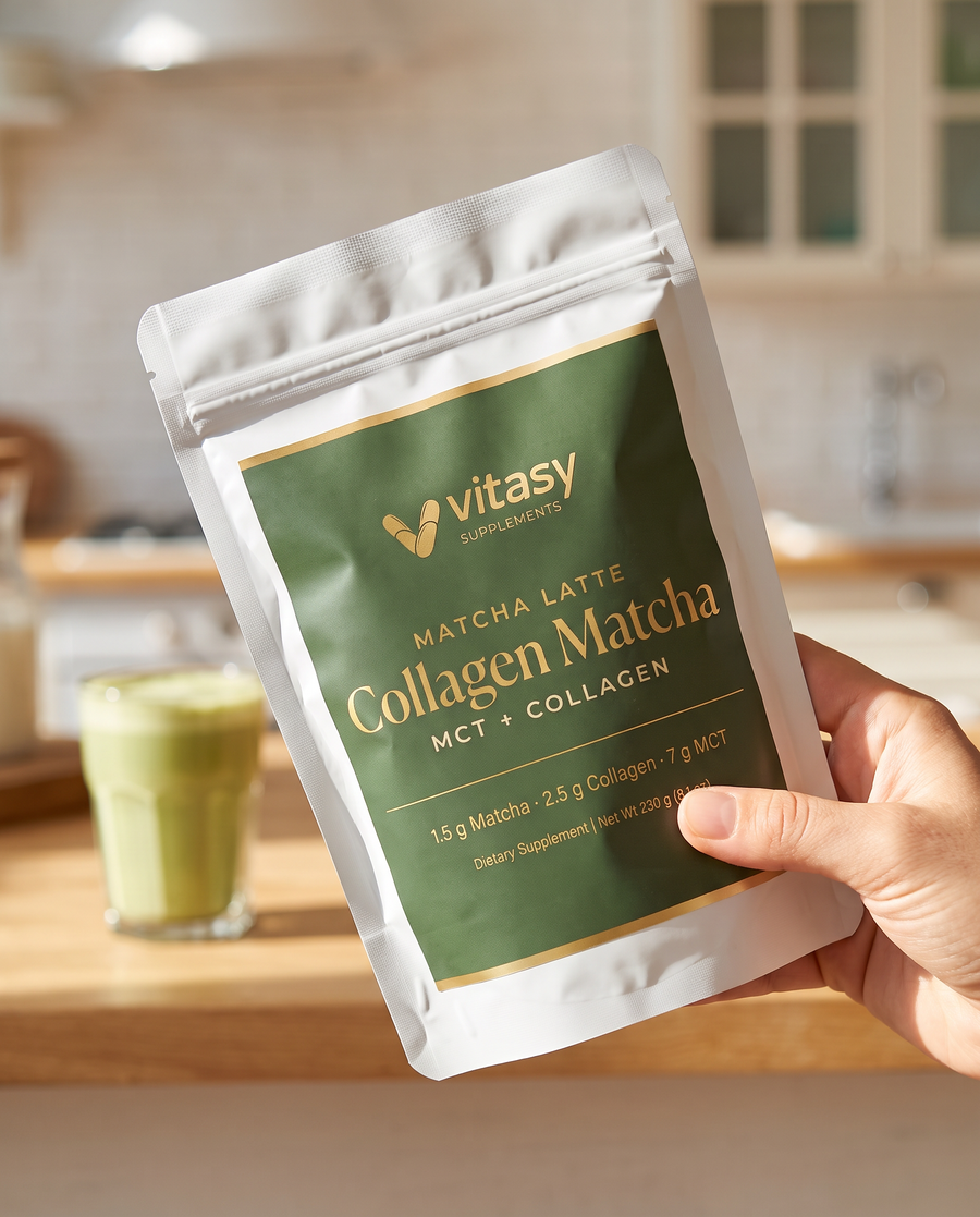Hand holding the Collagen Matcha pouch in a kitchen