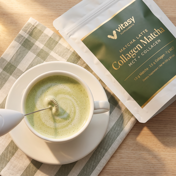 Frothing a collagen matcha latte next to the Vitasy pouch