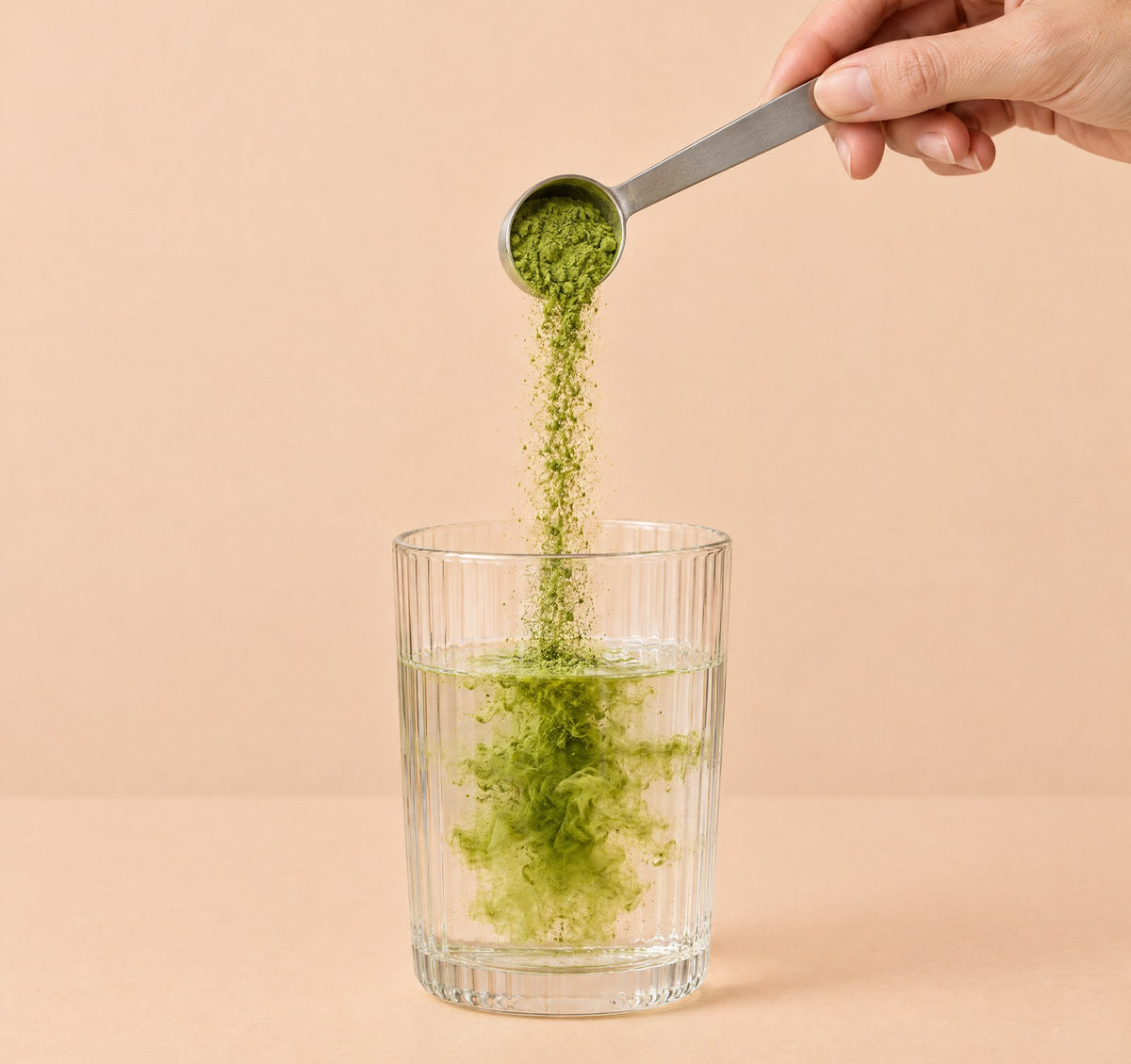 Matcha powder poured into a glass