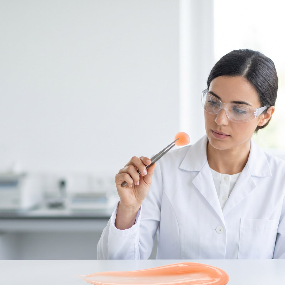 Quality check of a peach gummy in a lab
