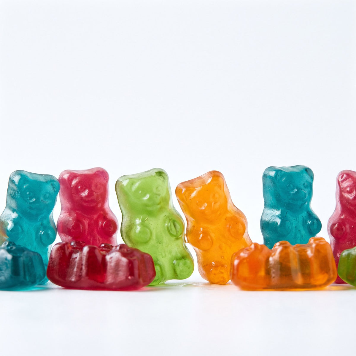 Row of colorful creatine gummy bears