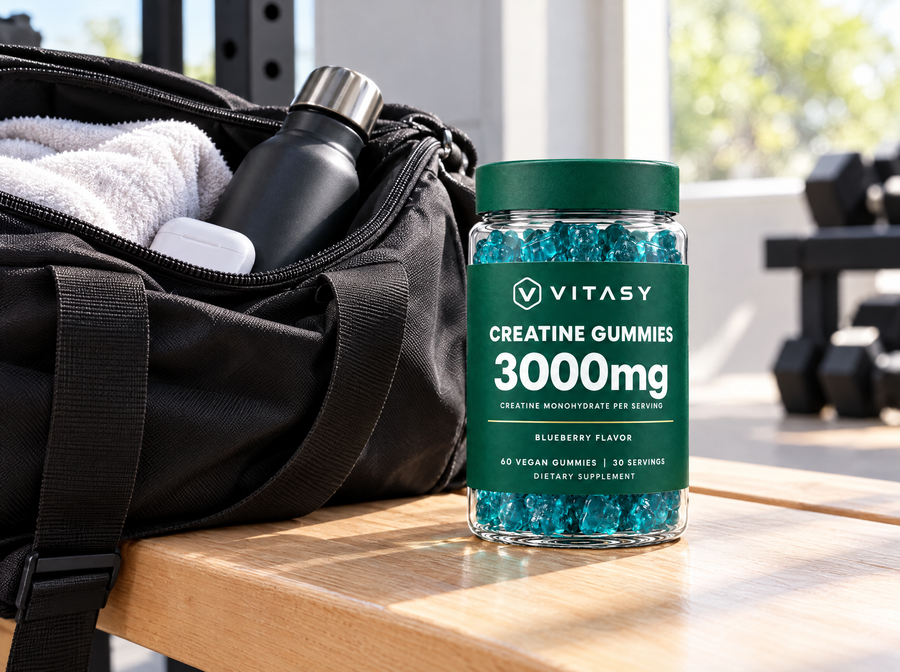 Vitasy Creatine Gummies jar next to a gym bag