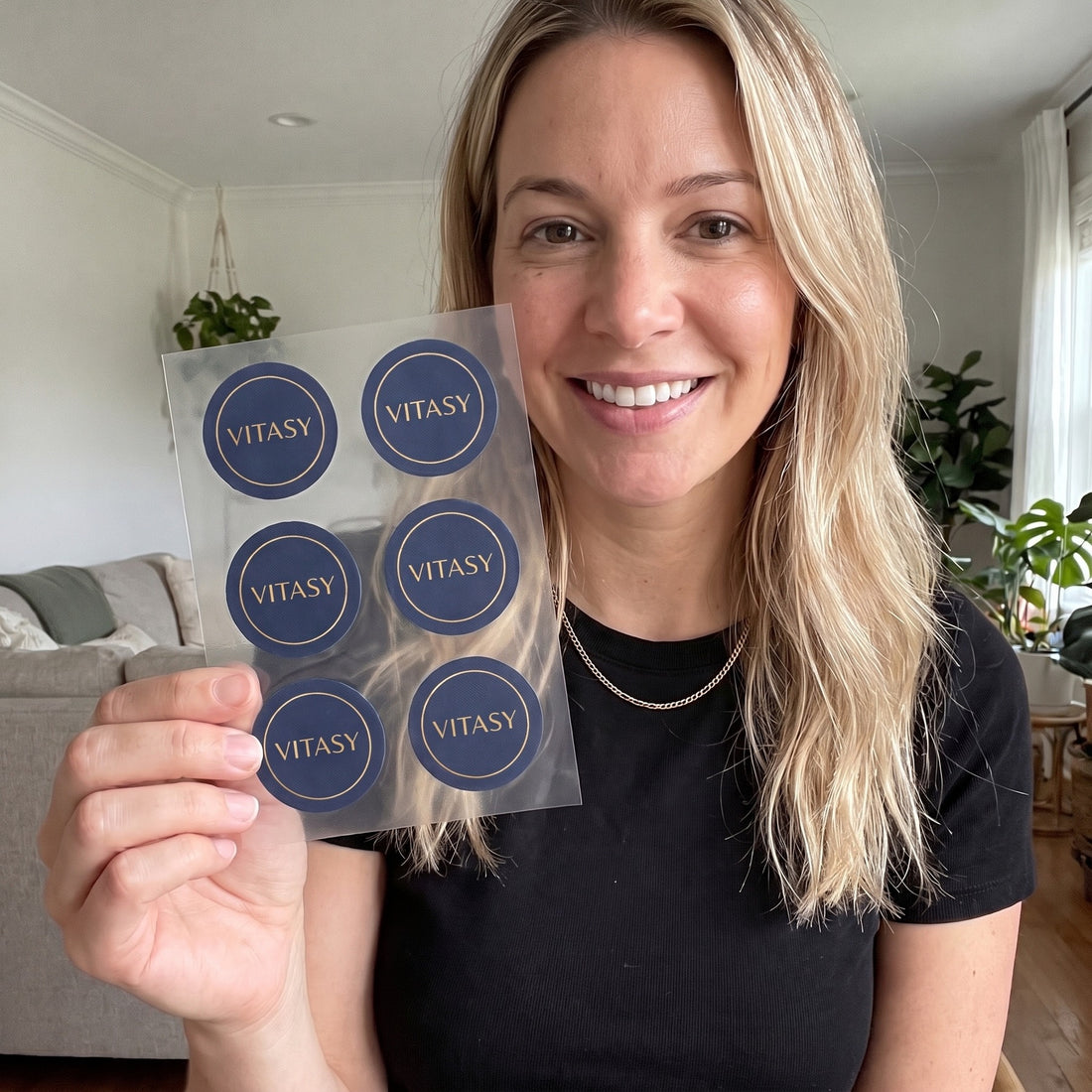 Woman holding a sheet of Energy Patches