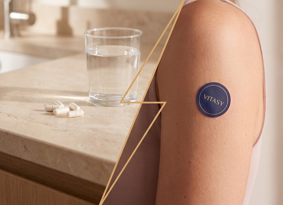 Capsules and a glass of water on one side, a navy Vitasy patch on the skin on the other