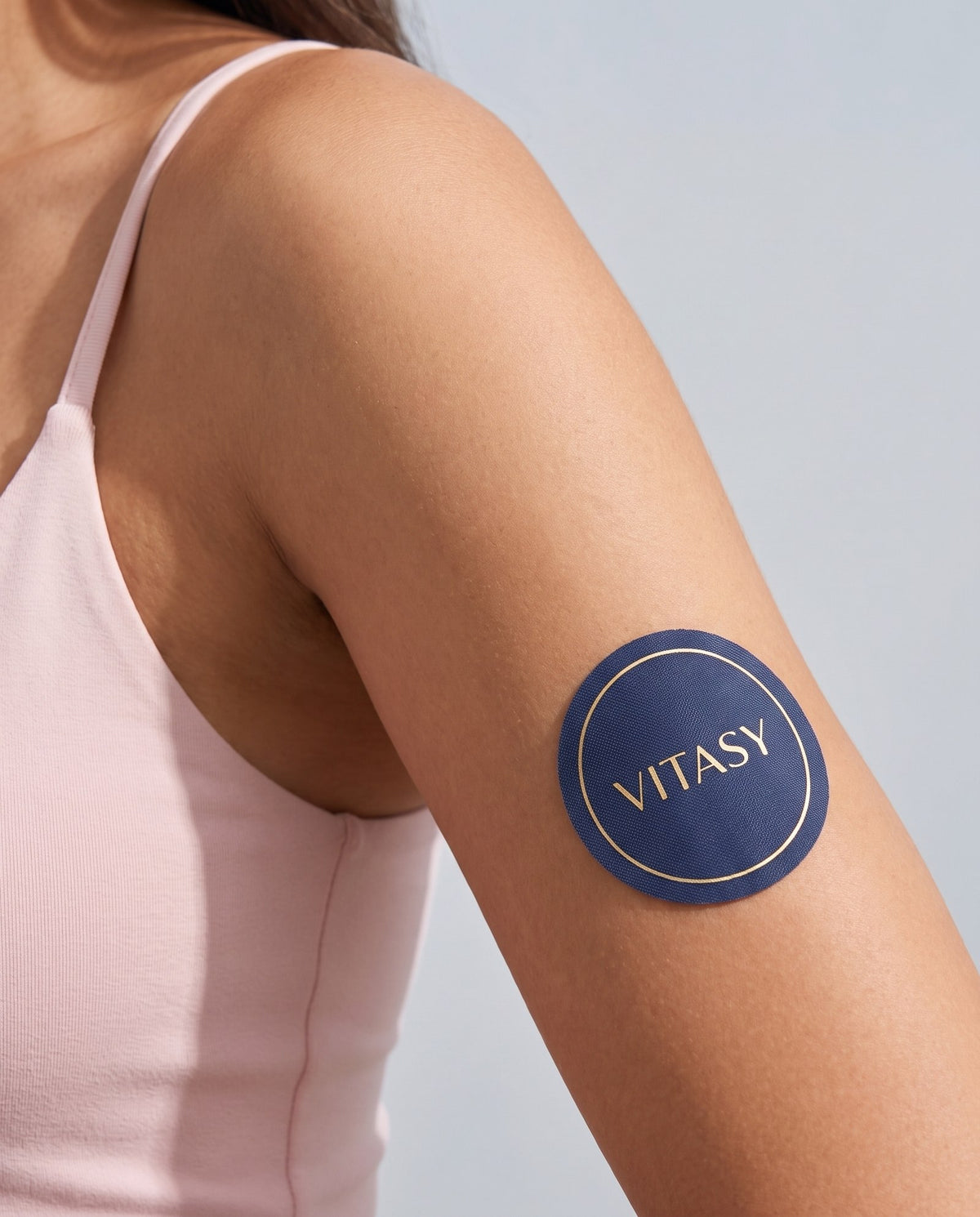 Vitasy focus patch worn on the upper arm
