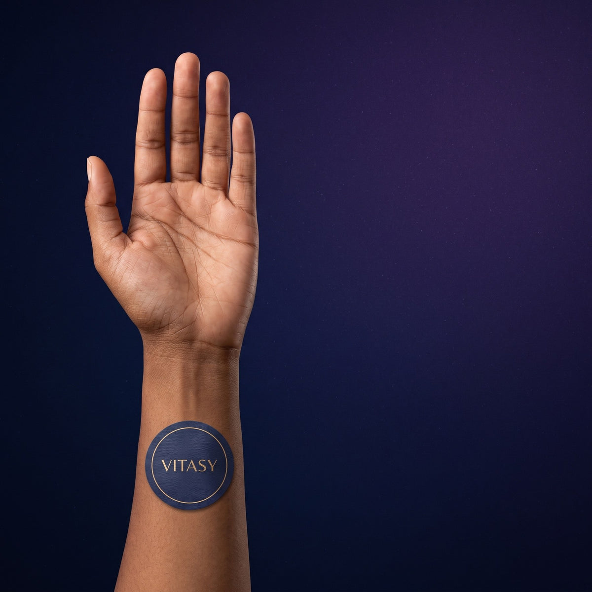 Vitasy Focus Patch worn on the inner forearm