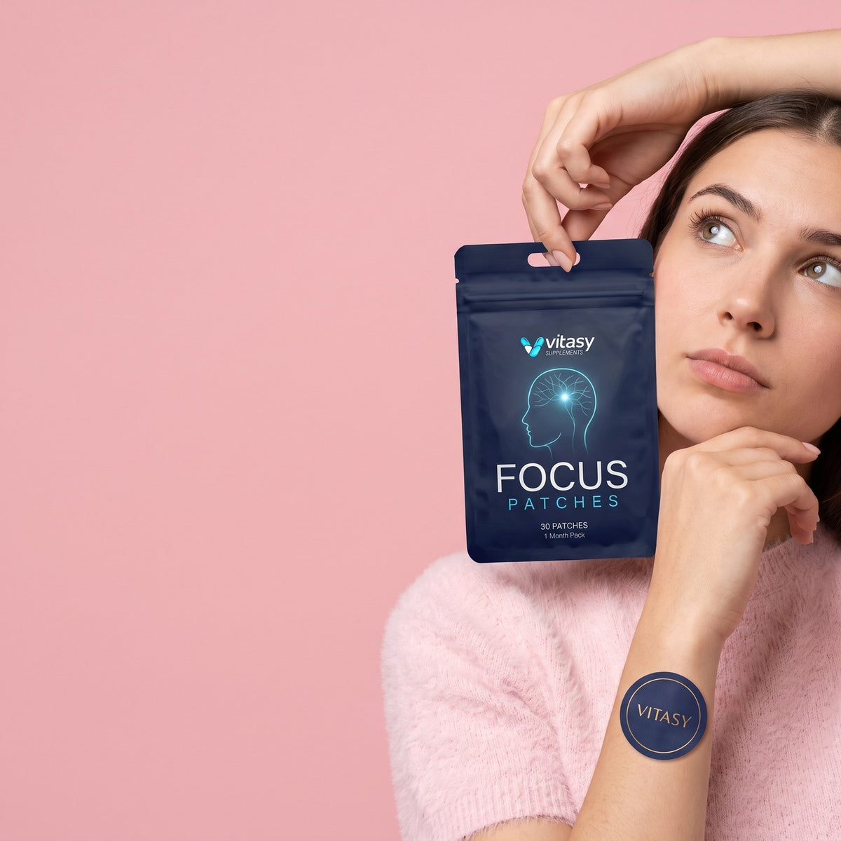 Woman holding a pouch of Vitasy Focus Patches