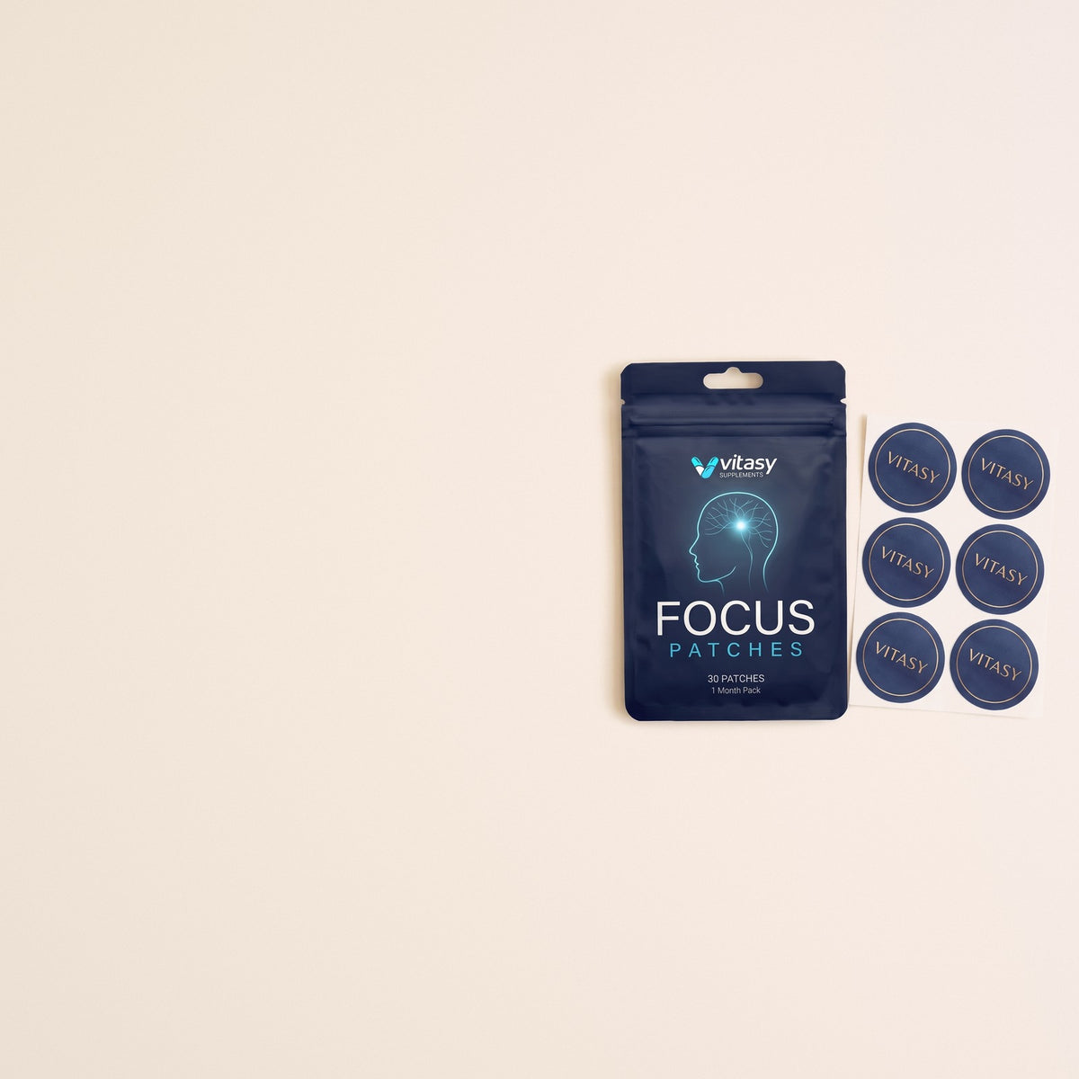 Pouch of Vitasy Focus Patches with a sheet of round navy patches