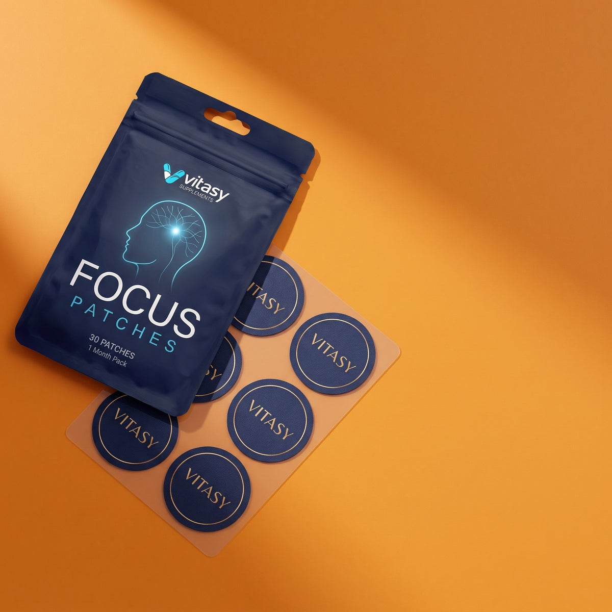 Vitasy Focus Patches pouch and patch sheet on orange
