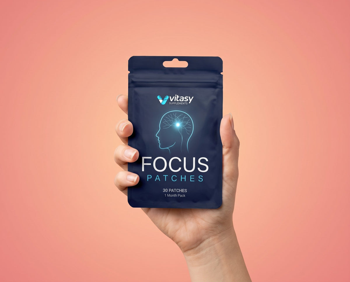 Hand holding a Vitasy Focus Patches pouch