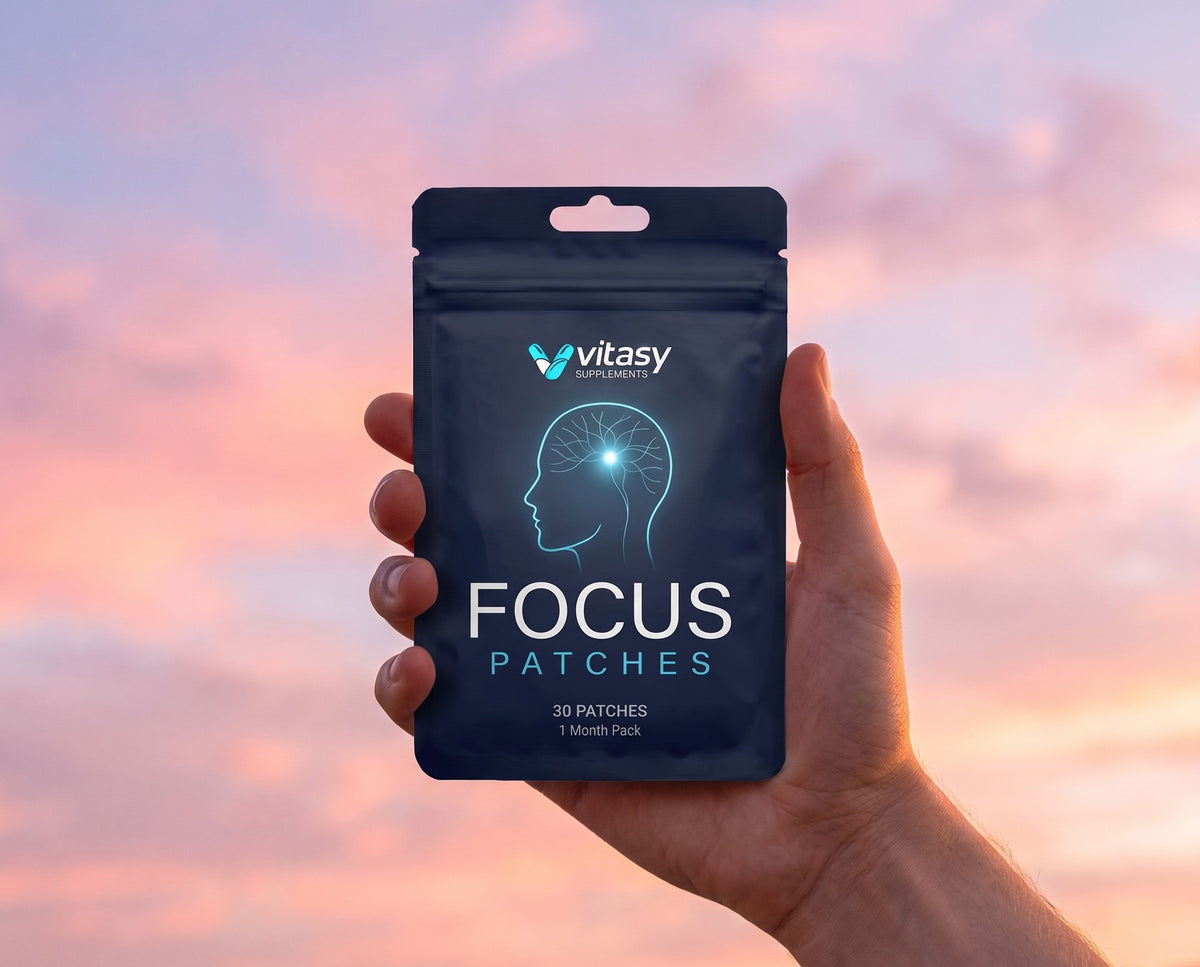 Vitasy Focus Patches pouch held up against a pastel evening sky