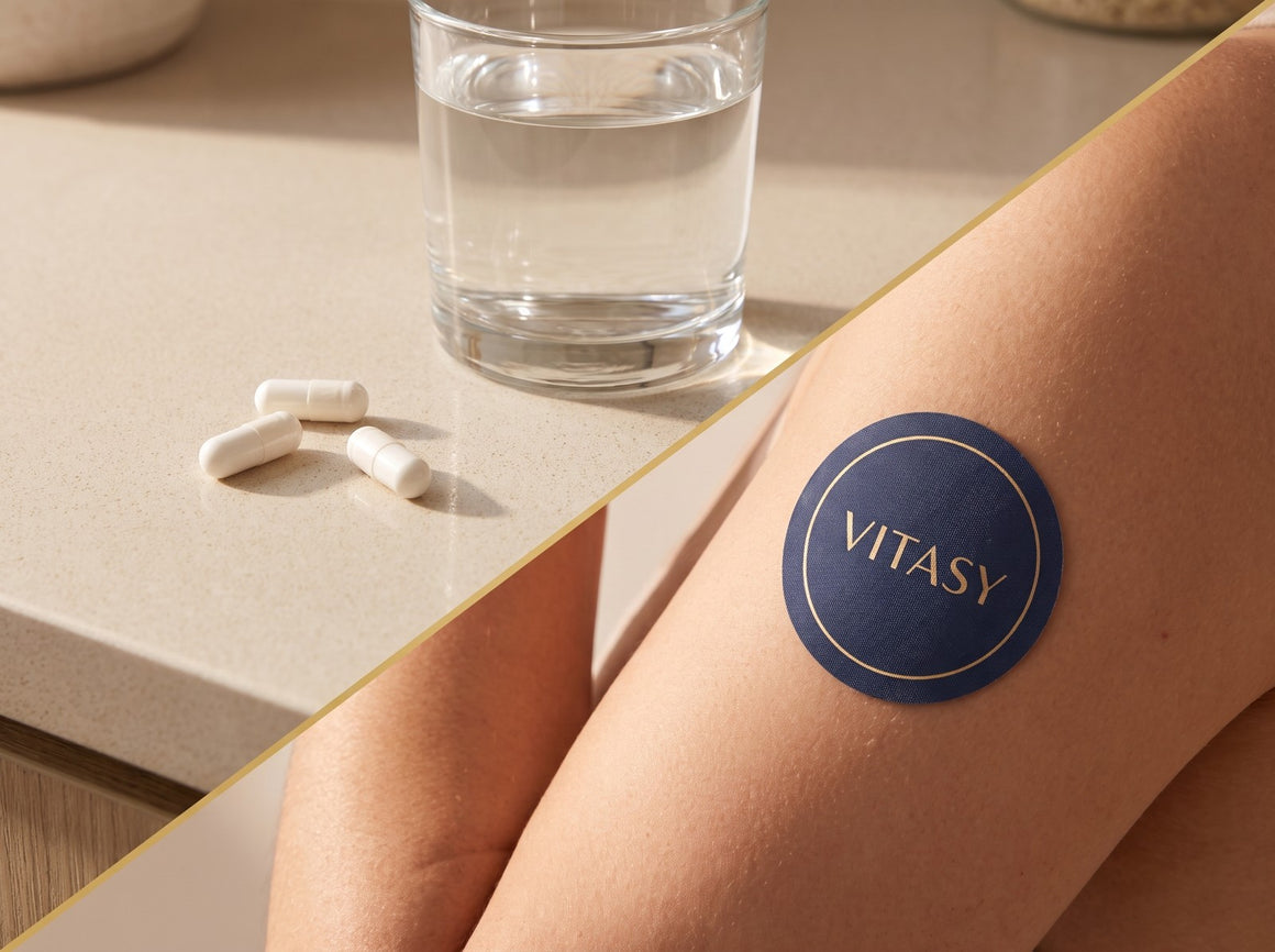 Capsules and a glass of water next to a navy Vitasy patch on an upper arm