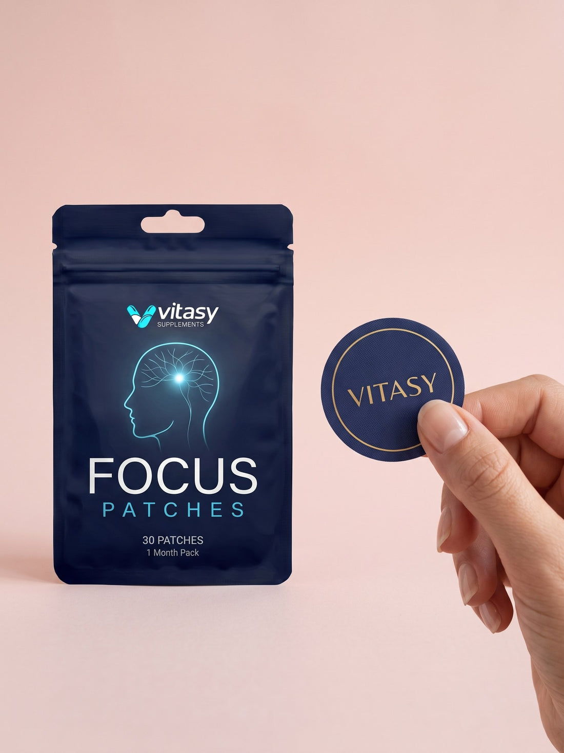Vitasy Focus Patches pouch and a hand holding a Vitasy patch