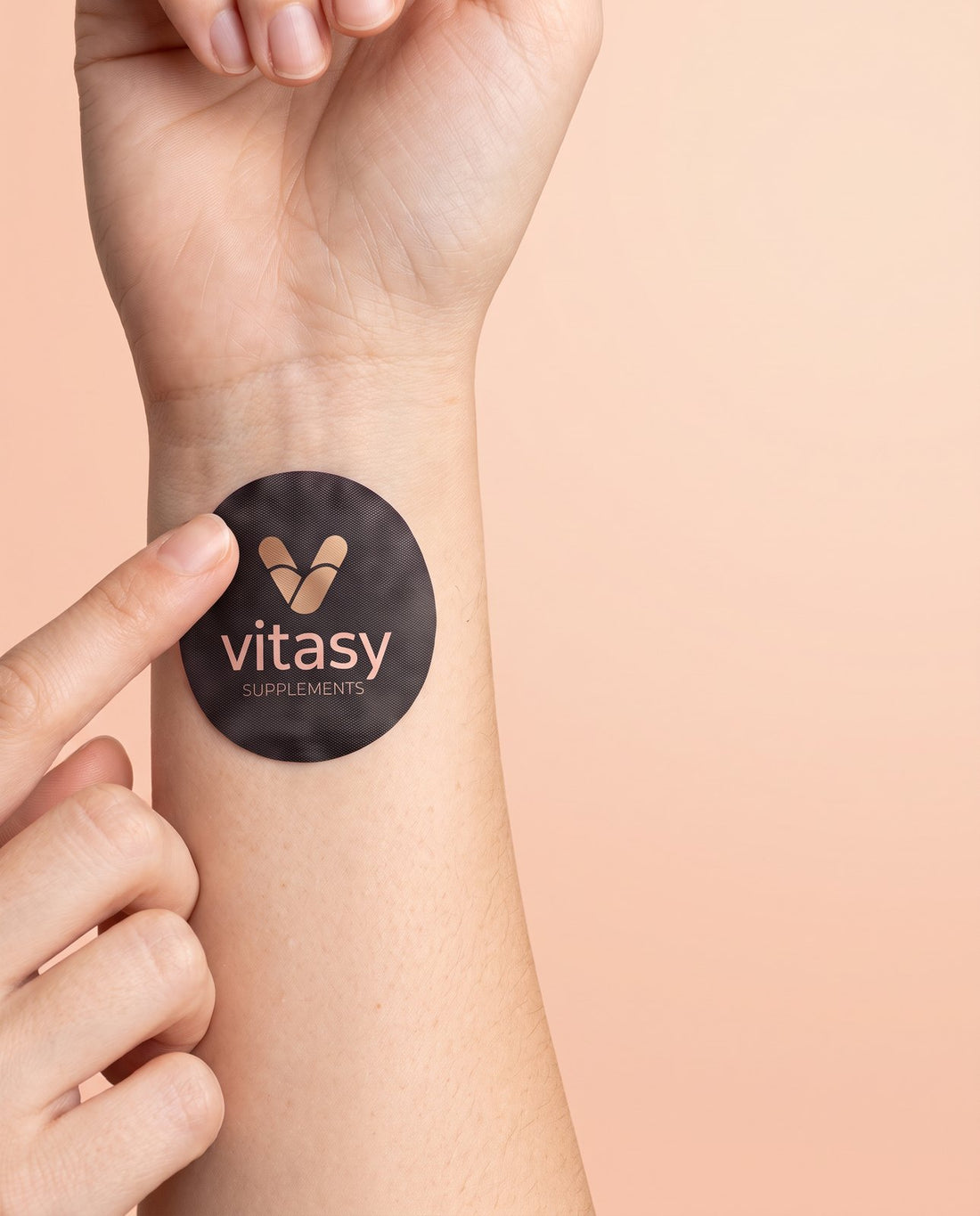 Applying a Vitasy patch to the wrist